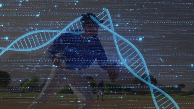 Pitcher striding into windup releasing ball delivering baseball pitch while DNA helix overlaying