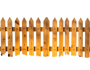 A weathered wooden picket fence isolated against a black background