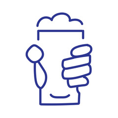 Hand holding a glass of frothy beer, celebrating a moment of enjoyment