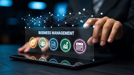 Business Management interface on tablet being operated by hand closeup view