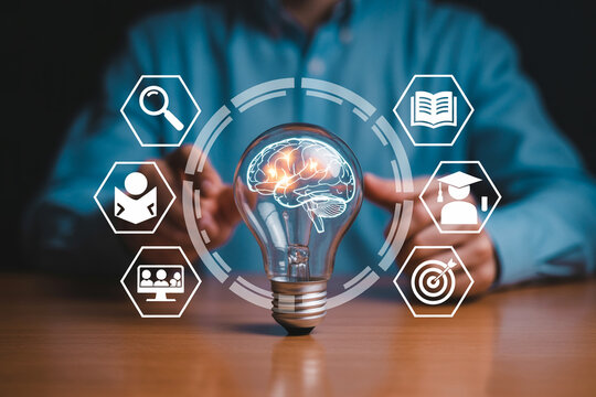 Lightbulb with brain illustration surrounded by learning icons represents education knowledge and innovative ideas for online courses and educational resources promoting creativity