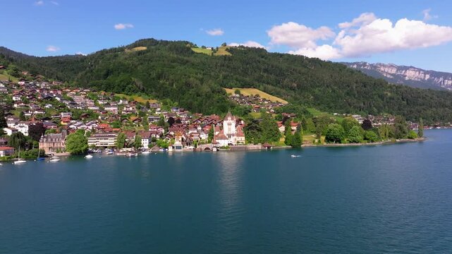 The beautiful Interlaken valley and Thunersee lake, Beatiful river at Switzerland in sunny day during summer, Aereal drone view of stunning idyllic nature scenery of lake Brienz with turquoise waters
