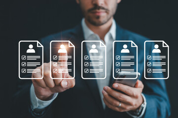 Businessman interacts with digital checklist icons on a smartphone representing task management project completion and successful workflow in a modern corporate environment for productivity and effici