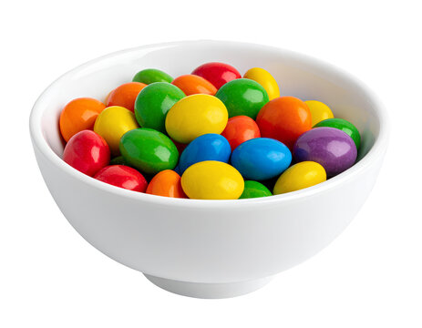 Bright multicolored candy coated chocolates neatly placed in a white bowl, isolated on transparent background.