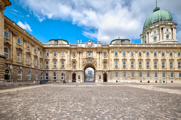 Fototapeta premium Budapest, Hungary - July 28, 2025: Exteriors of the Budapest Castle — a restored Neo-Renaissance building complex in Budapest, Hungary, located on the Buda side of the Danube 
