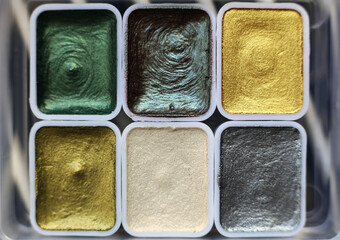 photo of metallic watercolor paint palette