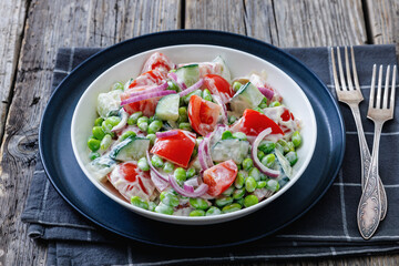 creamy tomato cucumber edamame bean onion salad
