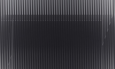 Modern architectural facade with repetitive dark vertical lines