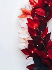 Decorative leaves arrangement with fairy lights in red and white with copy space