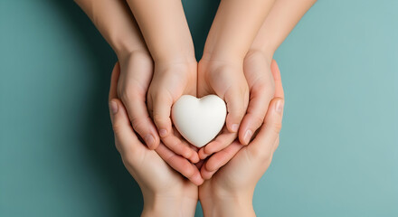 Family holding a white heart in their hands on a blue background, love and care concept