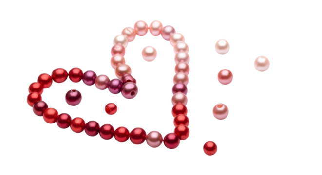 Elegant heart shape formed by graduated pink and red pearls