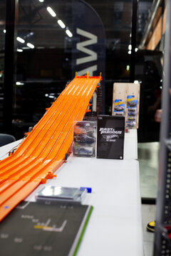 Moscow, Russia, November 2, 2025: The Hot Wheels Orange Track features multiple lanes for scale car racing for kids and collectors. 1 to 64 track for cars