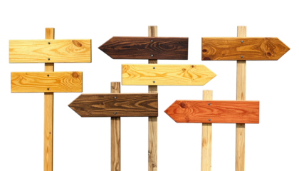 Assortment of arrow-shaped wooden directional signs in various wood tones against black