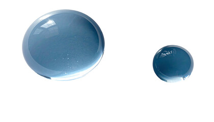 Two translucent, spherical bubbles against a stark black backdrop. They reflect light and sky