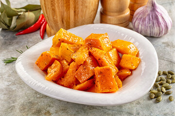 Vegan cuisine - baked pumpkin with herbs