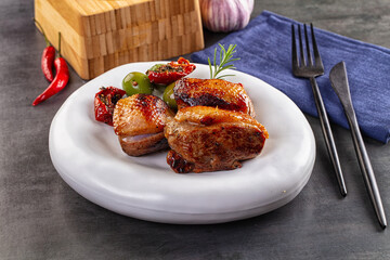 Roasted duck medallion with dry tomato