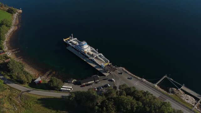 Norwegian ro-ro ship loading cars and passengers, seen from the air