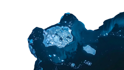Aerial view of an icy formation with scattered chunks and dark ocean water