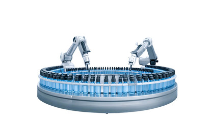 Robotic arms filling vials on a circular conveyor belt in a pharmaceutical setting