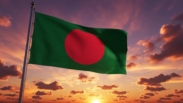 Bangladesh Flag Against Dramatic Sunset - The flag of Bangladesh flutters proudly against a vibrant sunset sky. The red disk on the flag is a striking contrast to the green field and colorful clouds.
