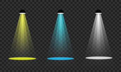 Three isolated colorful spotlights casting vibrant light rays