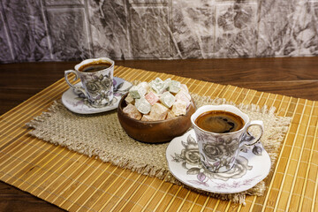 Rahat lokum and  two cups of turkish coffee 