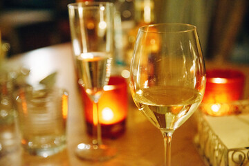 Wine Glass with Christmas Decorations and Festive Atmosphere