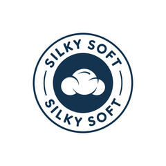 Circular badge emblem with fluffy clouds and the text silky soft