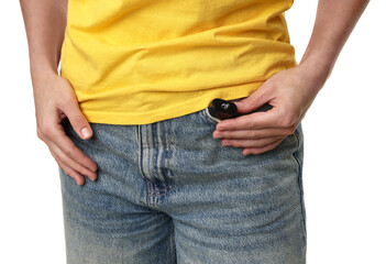 Young woman with hidden spy camera on white background, closeup