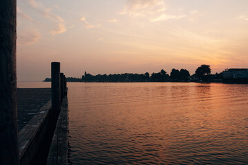 Fototapeta premium Sunrise at the Lake with Warm Golden Light