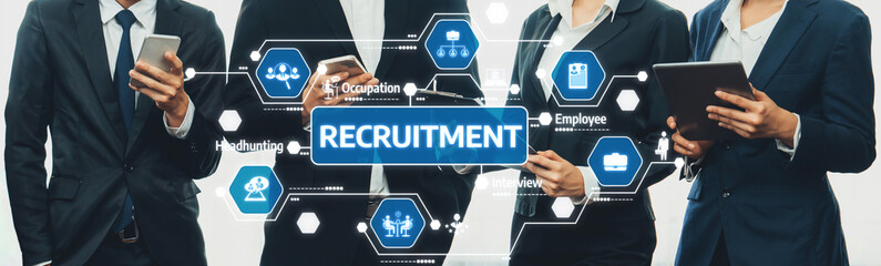 A group of business professionals engage with technology to streamline the recruitment process....