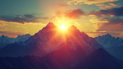 Sunrise over dramatic snow-capped mountains with vibrant sky and sunburst