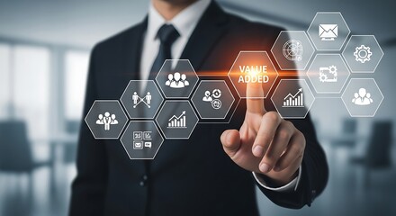 Businessman touching a screen with value added icons