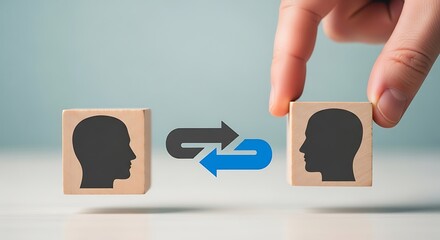 Wooden blocks with human head silhouette symbolizing communication