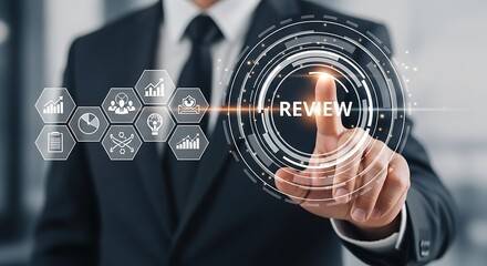 Businessman touching a digital screen with the word review