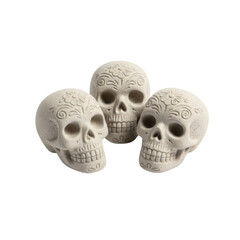 Obraz premium Three decorative skulls adorned with floral motifs, symbolizing remembrance and tradition