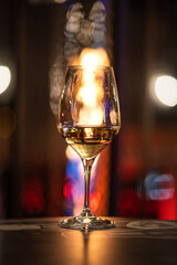 White wine glass celebrating night in a bar