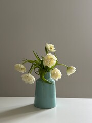 bouquet of yellow-white tulips in a vase
