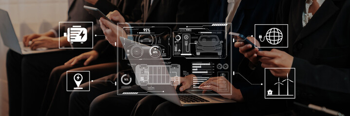 A group of business professionals use laptops and smartphones to engage in digital data analysis, showcasing modern technology alongside dynamic data interface elements. Trope