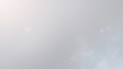 A blurry gray background with a few white circles. The background is mostly gray with some white
