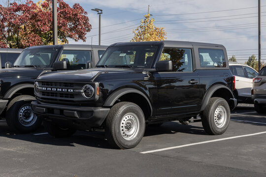 Ford Bronco Base 2-Door 4X4 display at a dealership. Ford offers the Bronco with a 2.3L EcoBoost 4-Cylinder engine. MY:2025