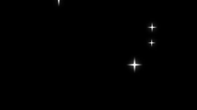 Flashing lens flares, at the stadium concert multiple camera flashes on black background.  Photographer camera flashes. Glowing glitter burst sparkle effect overlay,Flashing lens flares.