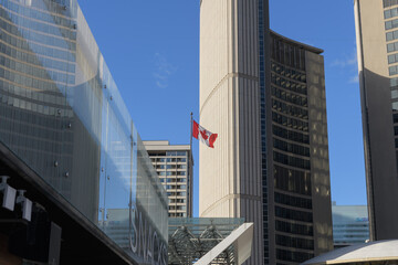 Fototapeta premium flag of Canada outside Toronto's City Hall, 100 Queen St W