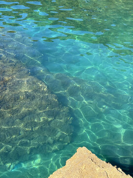 Sea emerald green water and cliff.