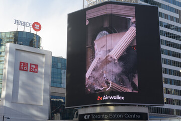 Fototapeta premium digital billboard for Airwallex, a financial tech company, on display at Sankofa Square, Toronto