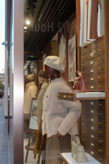 Fototapeta premium display window with mannequins and merchandise at Loro Piana, a clothing store, located at 111 Bloor St W, Toronto