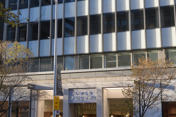 Fototapeta premium exterior building facade and sign of Luca Faloni, a men's clothing store, located at 130 Bloor St W, Unit 115, Toronto