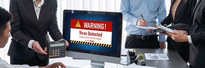 Virus warning alert on computer screen detected brisk cyber threat , hacker, computer virus and...