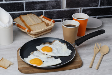 Breakfast scrambled eggs and fresh coffee