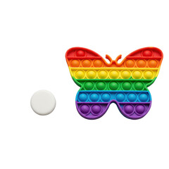 Vibrant rainbow butterfly Pop It toy and a small matte white ceramic disk on a uniform transparent studio background, even lighting. Modern product display for fidget toys